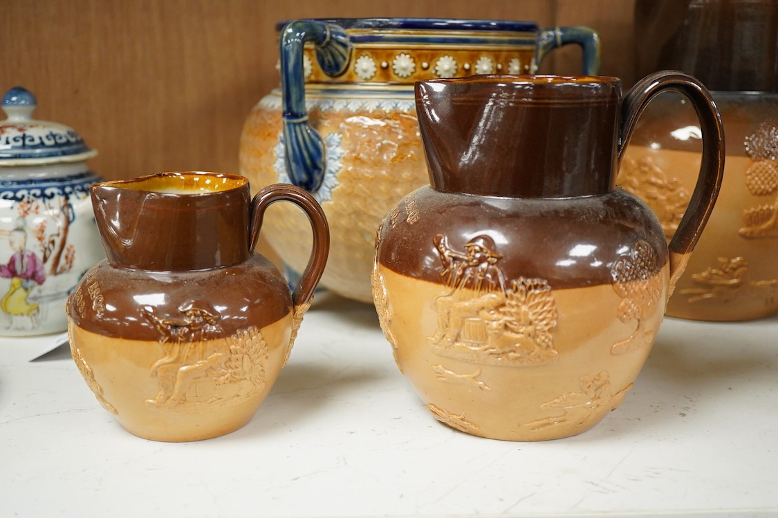 Four graduated Royal Doulton harvest jugs and a Royal Doulton Lambeth three footed jardiniere- 17cm high